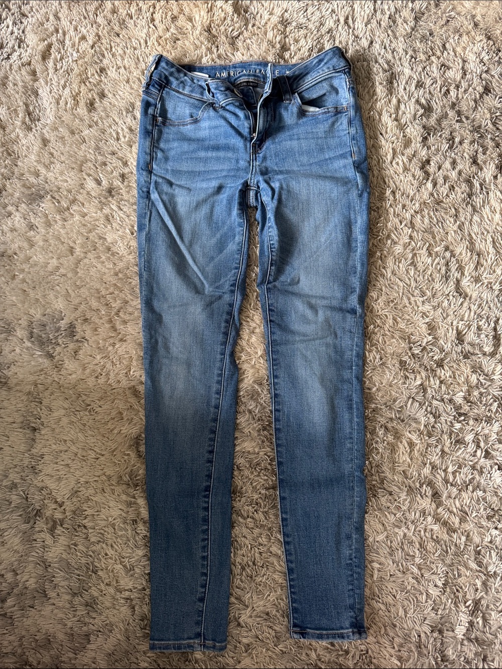 American Eagle Light Wash Blue Jeans - Next Level Stretch Skinny Jeans